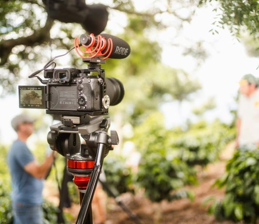 Great Documentary black dslr camera on tripod