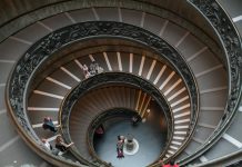 Change This One Thing & Change Everything About Your Life ∞The Creators ~ by Daniel Scranton a group of people standing on top of a spiral staircase