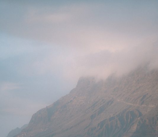 Your Life’s Work, Purpose & Mission for Being on Earth ∞The Andromedan Council of Light ∞ by Daniel Scranton Waves crash in front of a misty mountain.